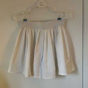 White tennis skirt brand If it Were Me.